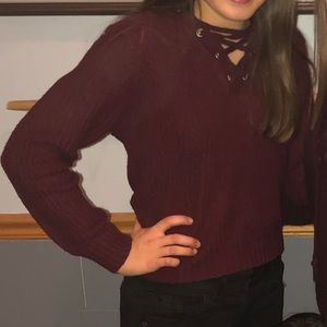 Maroon rue 21 cropped hoodie/sweater with strings.